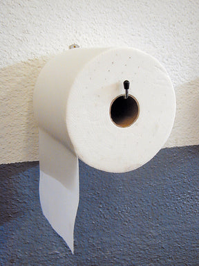 Portarotolo da parete MINUTEX in acciaio zincato bianco con rotolo di carta